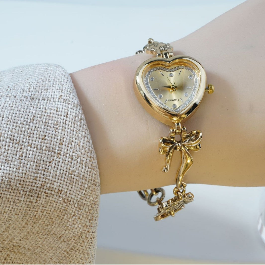 Goldiluxx Retro Heart-shaped Bracelet Watch With A Golden Bow And Flower Design A Stylish Womens Timepiece
