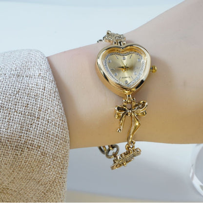 Goldiluxx Retro Heart-shaped Bracelet Watch With A Golden Bow And Flower Design A Stylish Womens Timepiece