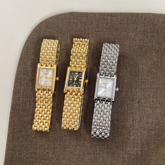 Goldiluxx Golden Quartz Rectangular Watch With A Steel Band For Women.